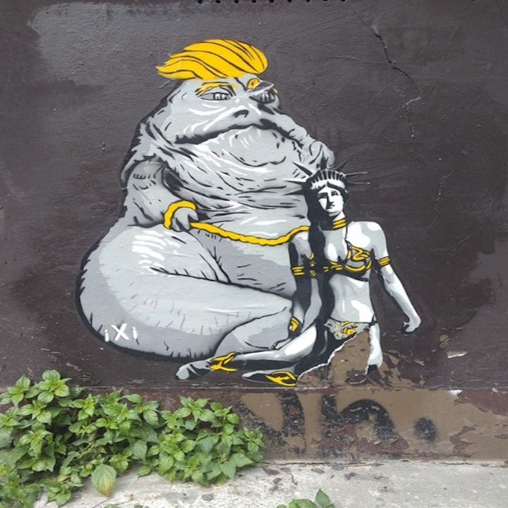 Banksy Lady Liberty is a prisoner of Big Brother